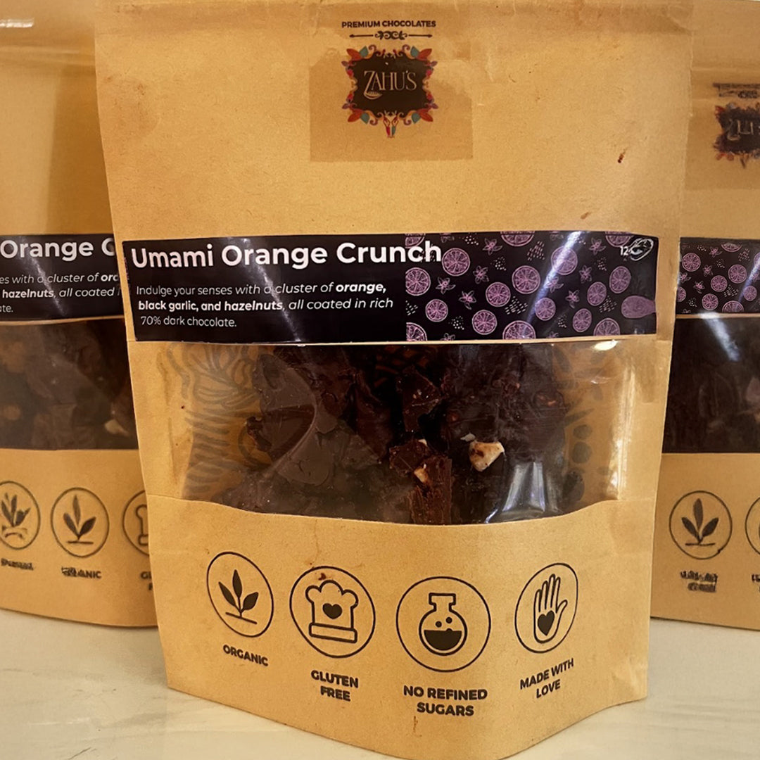 umami orange crunch - 70% dark chocolate with orange, hazelnuts & black garlic